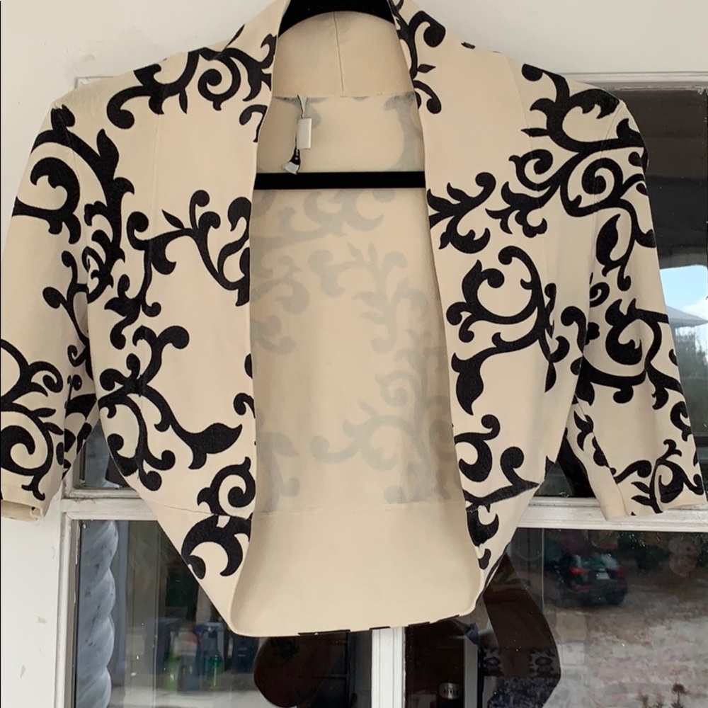White House Black Market Shrug